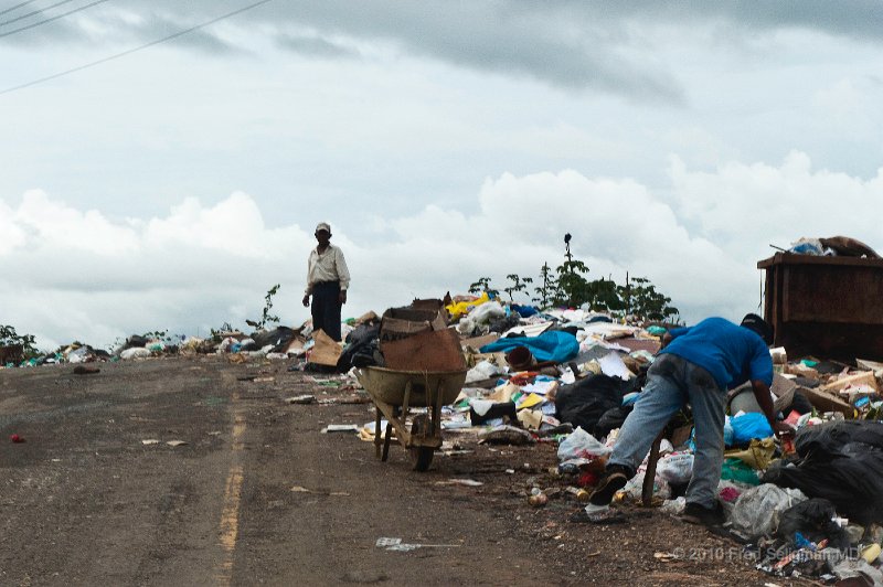 20101203_140712 D3.jpg - Picking trash on the roadside